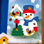 Schneemann mit Vogelhaus
